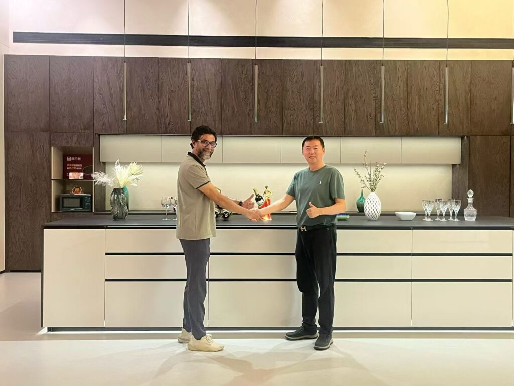 GAZLL meeting a kitchen cabinet supplier in a showroom