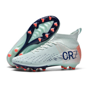 111-SKY light blue CR7 soccer cleats and coral-stud outsole on white background