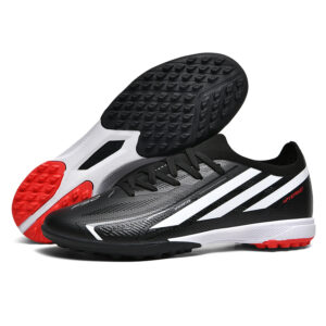 F50-BLK-T black turf soccer shoes with white stripes and red sole accents – product view 1