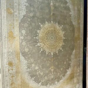 Taupe and Gold Medallion Rug displayed on a carpet showroom rack, model CR-005