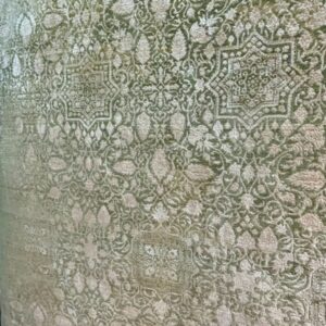 Olive Floral Pattern Rug displayed on a carpet showroom rack, model CR-007