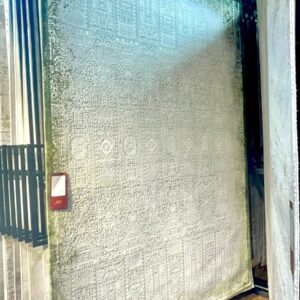 Light Grey Ornamental Rug displayed on a carpet showroom rack, model CR-009