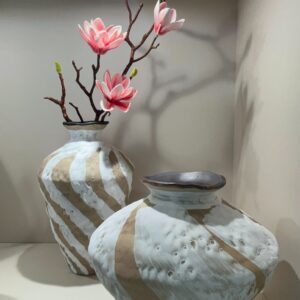 white and grey marbled decorative vases showroom design reference, view 1