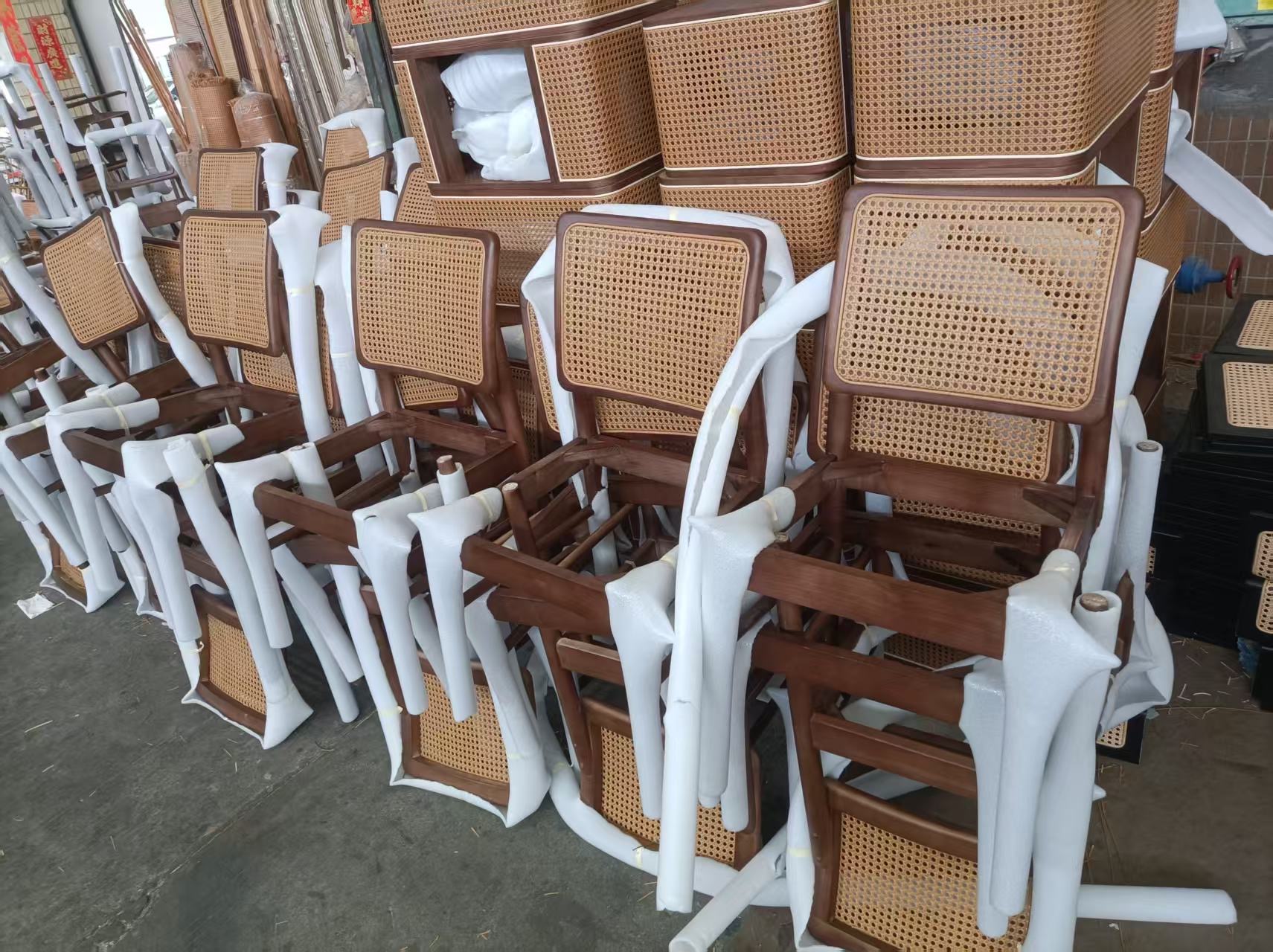 Rattan furniture production batch with protective wrapping