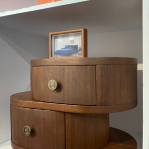 Sculptural wood tone bedside cabinet, furniture showroom reference for GAZLL wholesale bedroom furniture sourcing.